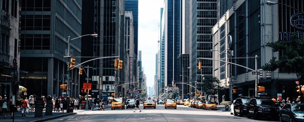 People moving through an urban plaza